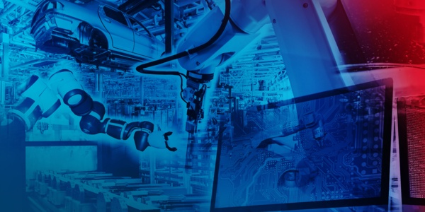 Automated automobile production with robots. In the foreground is a monitor on which the processes are simulated.