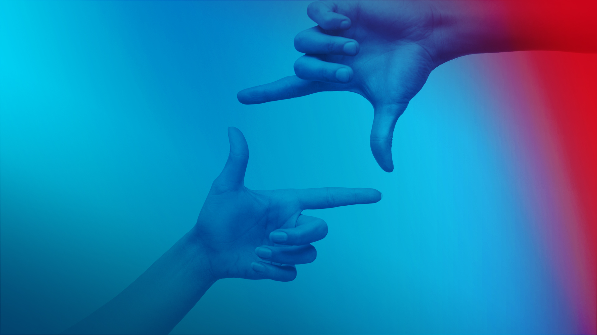 Two hands each with thumb and index finger form a symbolized square.