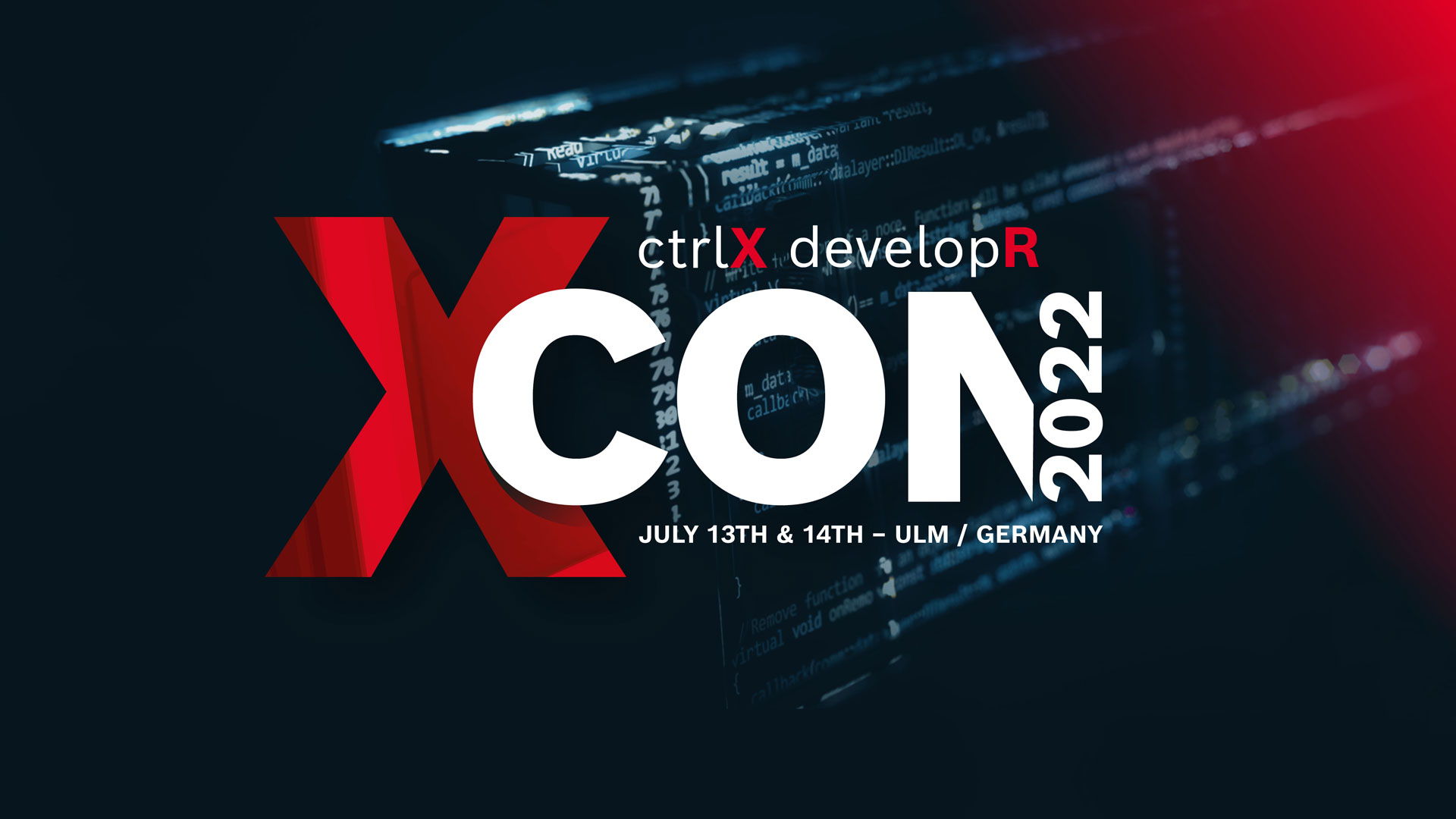 Schriftzug der ctrlX developR Confrence (XCON 2022). Im Hintergrund ist eine ctrlX CORE Industriesteuerung zu sehen.